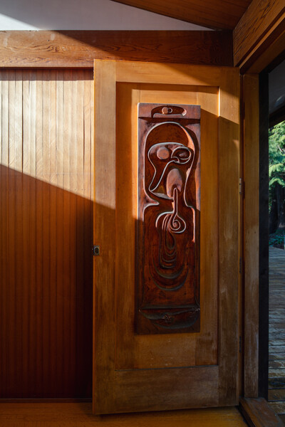 20th-century Sculptor Bill Reid designed some of the home's doors.