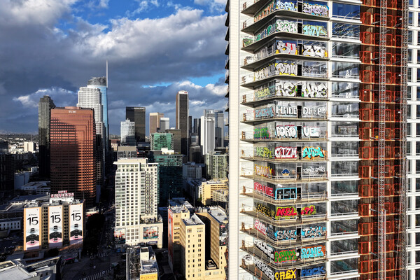 A year ago, at least 27 stories of an unfinished skyscraper in downtown LA were covered in graffiti.