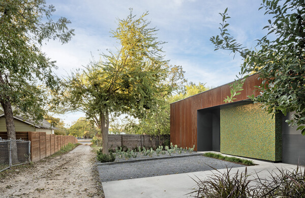 Dubbed the Stealth House in part for its windowless perimeter, the project began as an exploration designing comfortable, private living spaces in dense urban areas.