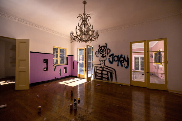 Graffiti inside of a home in Bel Air that partially belongs to Osama Bin Laden's half brother.