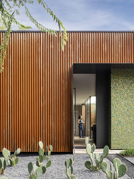 Scott Specht of Specht Novak Architects designed a 1,200-square-foot home in Austin for him and his wife, Shiraz Bakshai. The house features 2 bedrooms, 2 bathroom, and, notably, no exterior-facing windows.