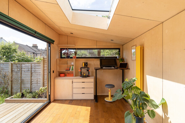 The long, rectangular window is a favorite of Mattias’ cat, who love to perch on its ledge and watch over the neighboring garden.