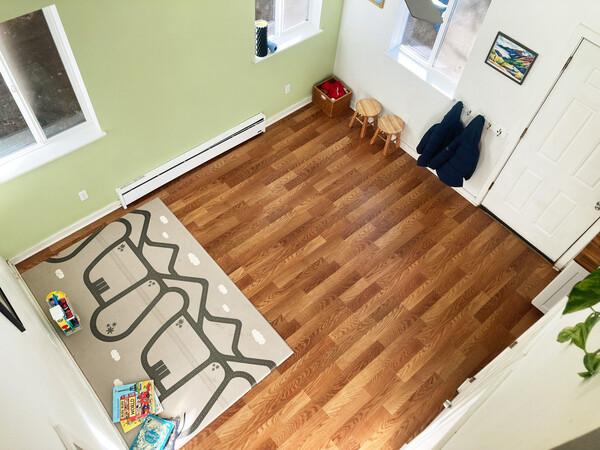 We kept a play mat in living/dining area for the kids.